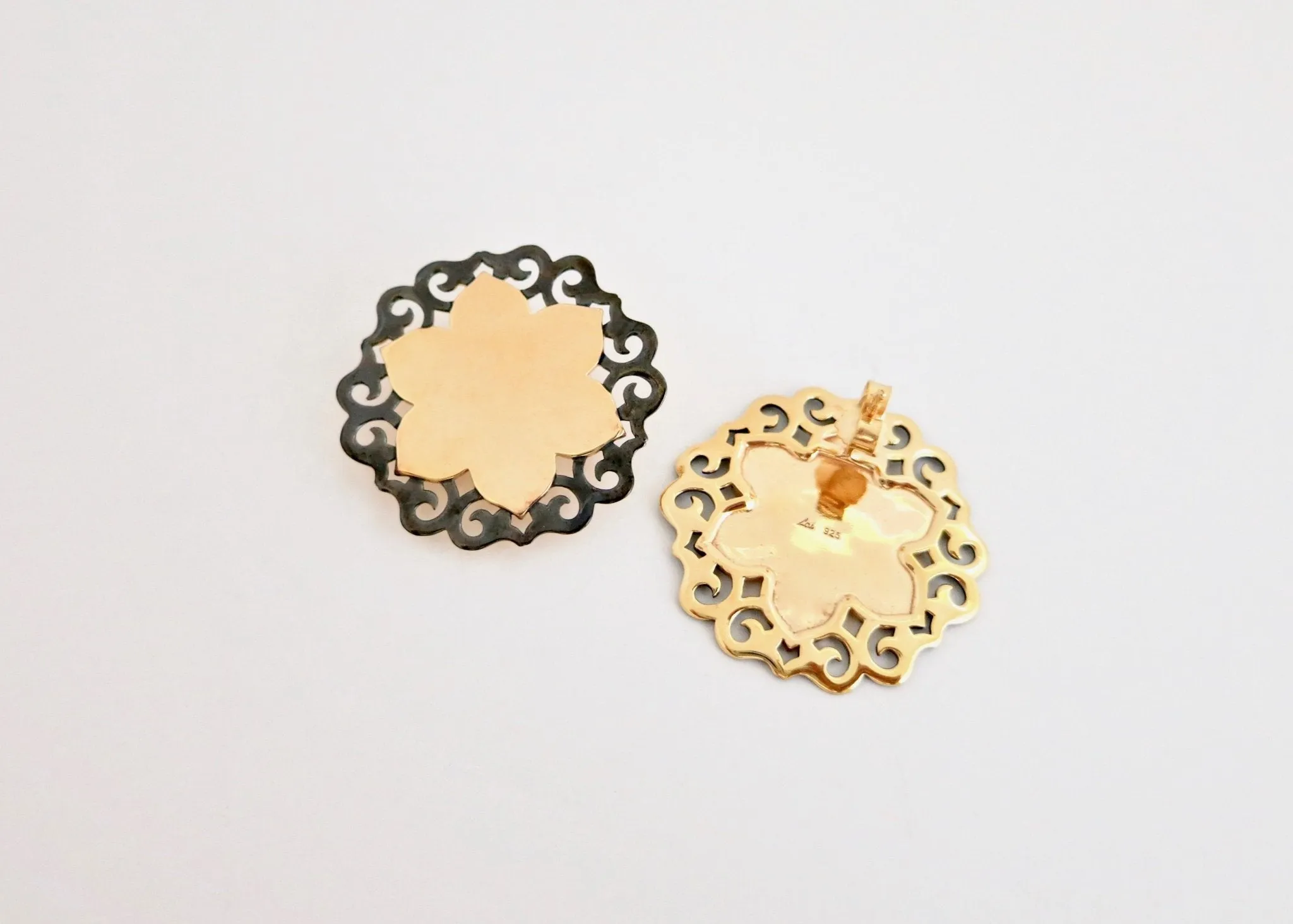 Dramatic, gold-plated, two-tone lotus studs