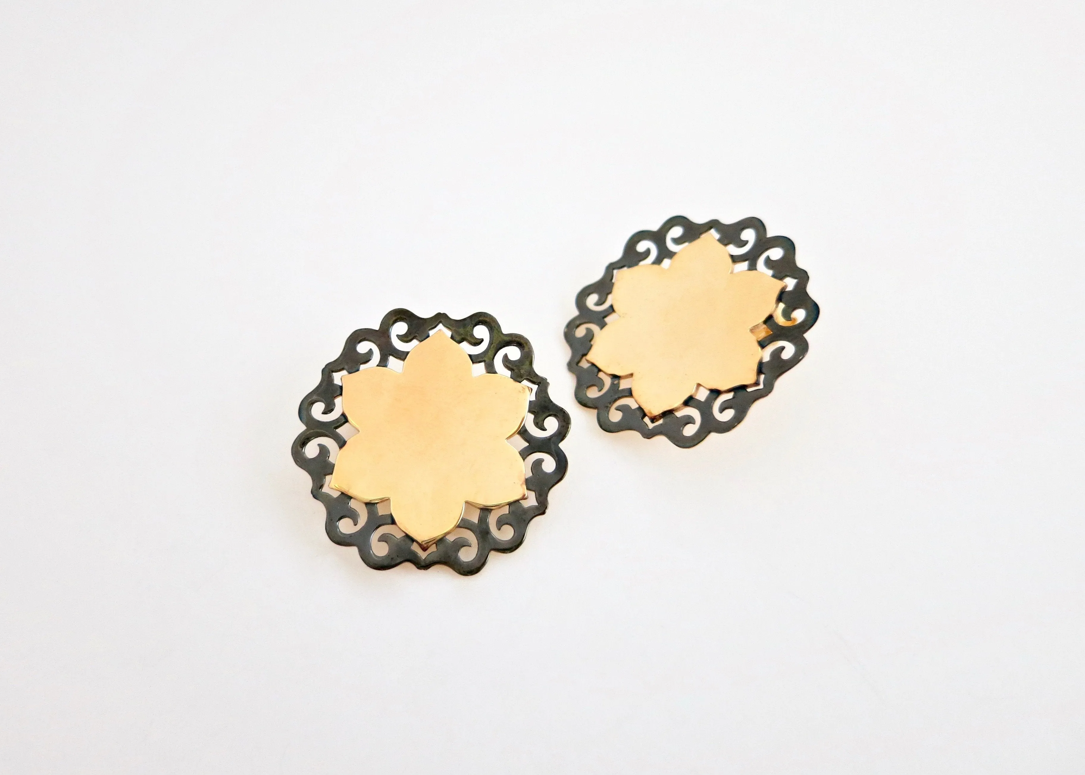 Dramatic, gold-plated, two-tone lotus studs
