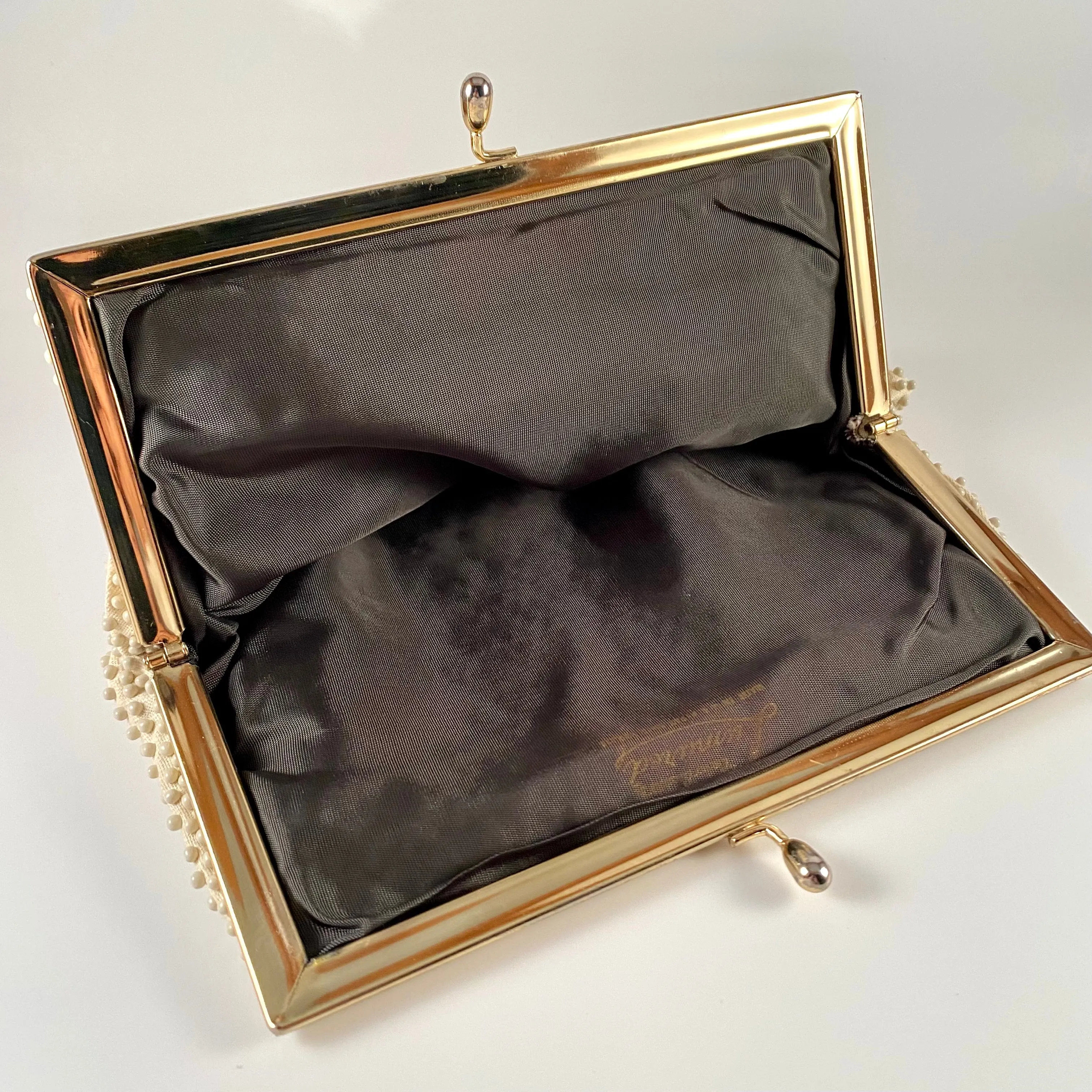 Late 50s/ Early 60s Lumured Ivory Beaded Clutch